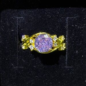 Elegant Gold and Purple Ring